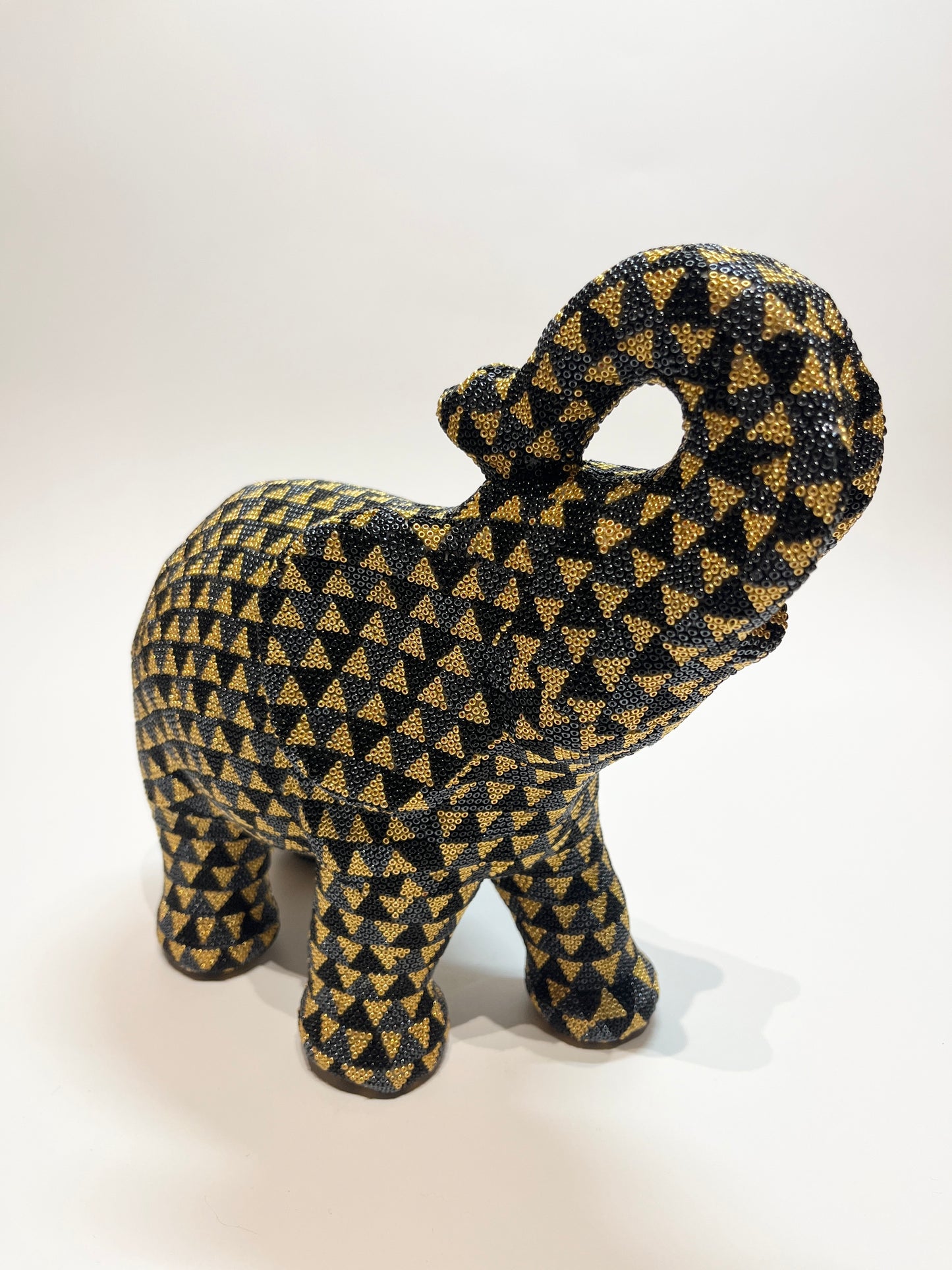 Large elephant black and gold