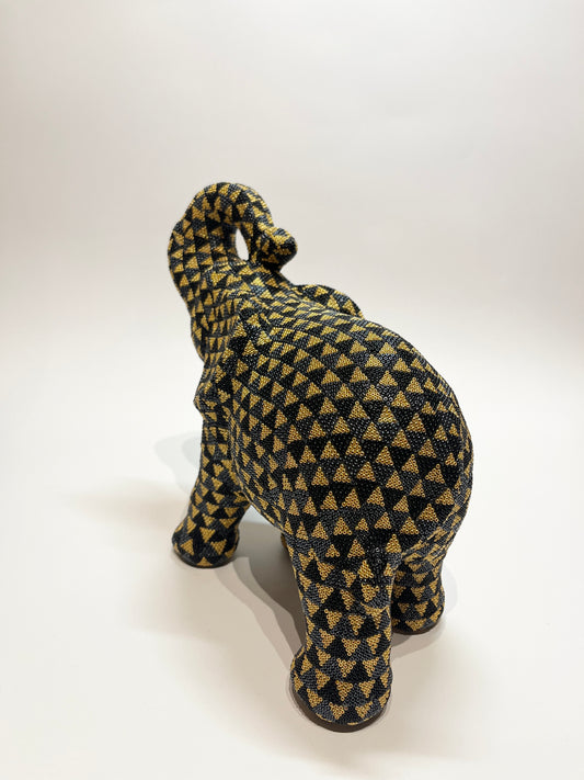 Large elephant black and gold